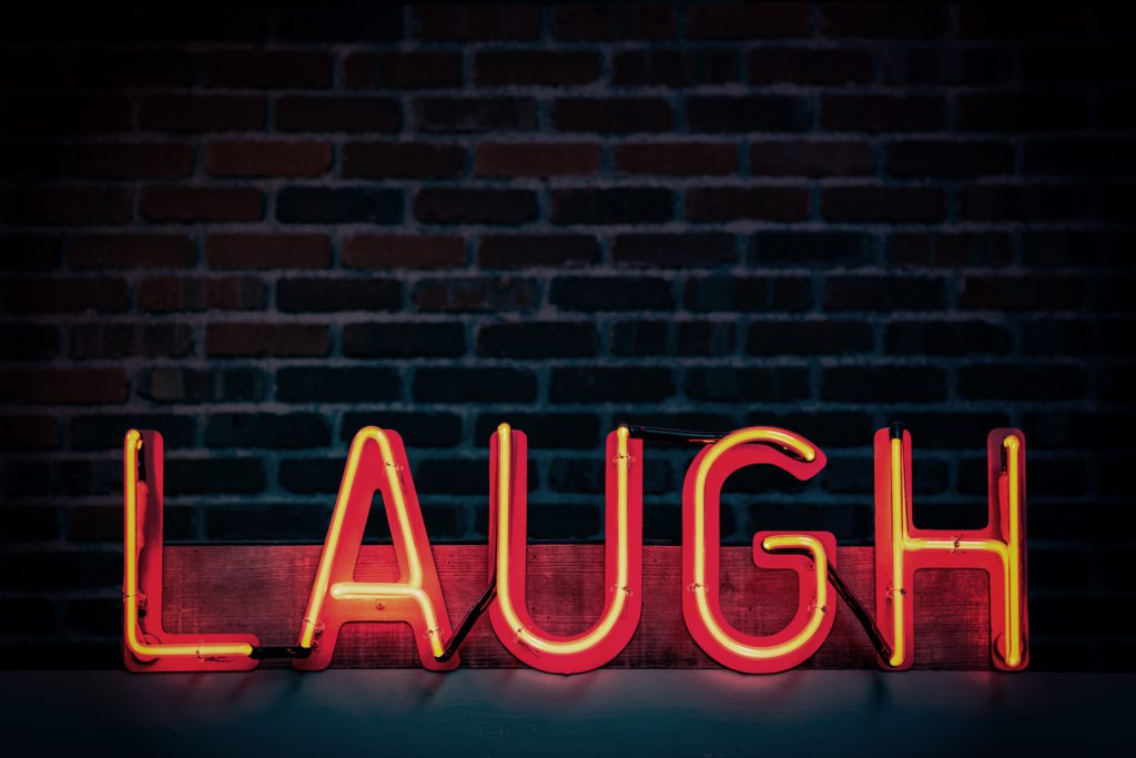 Peals of Laughter: Ring in the Holidays with Our Top Comedian Speakers